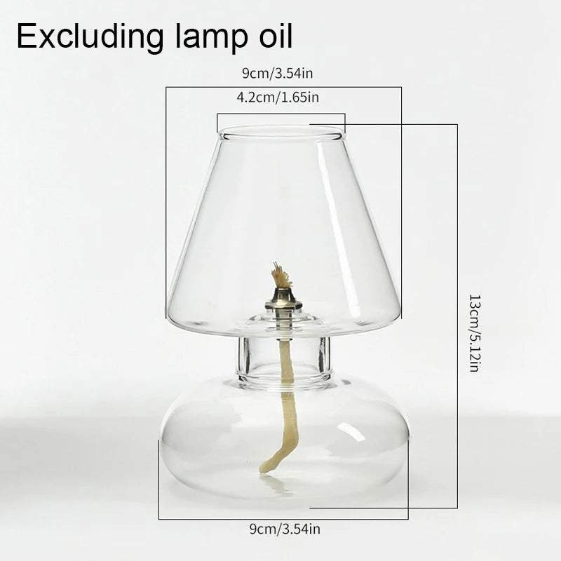 Clear glass oil lamp with dimensions on a white background