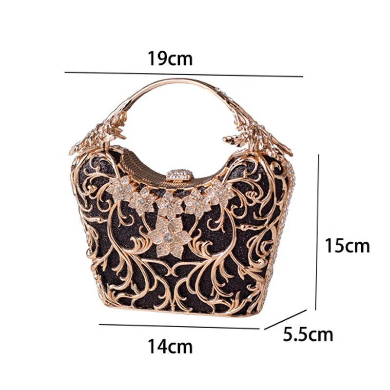 Gold and black handbag with floral patterns and measurements on a white background