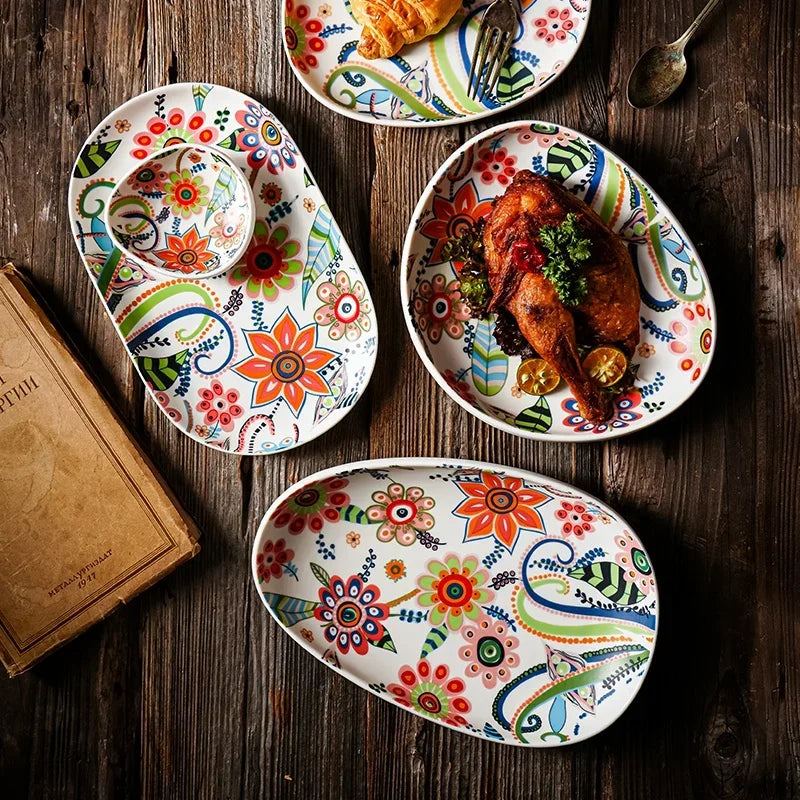 Colorful ceramic plates with floral designs on a wooden table.