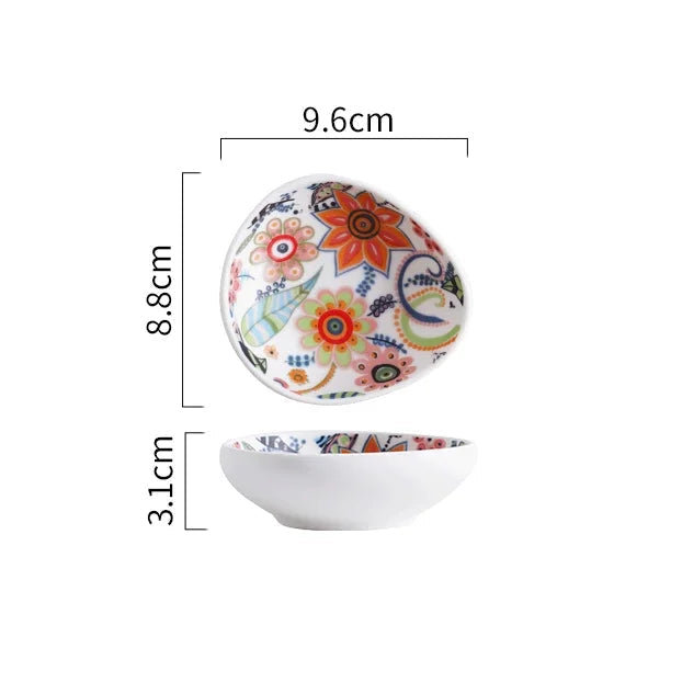 Decorative ceramic plate with floral design and measurements on a white background