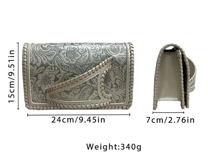 Silver clutch bag with floral pattern and measurements on a white background