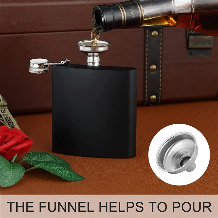 A matte black flask with a silver metal funnel and spout, shown with a bottle pouring liquid into it. A circular inset shows the funnel detail, and the text at the bottom reads 'THE FUNNEL HELPS TO POUR.