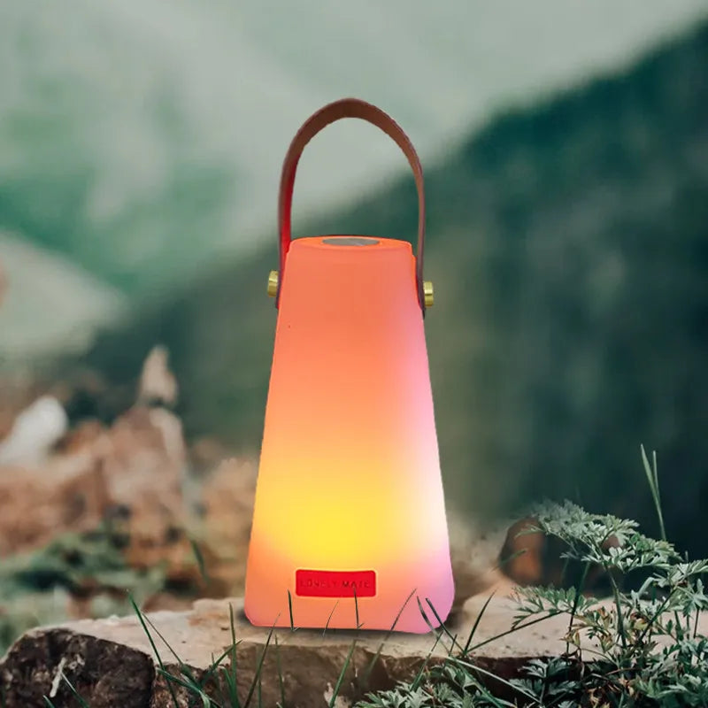 Portable lantern with a gradient light effect on a natural background