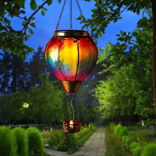 Colorful hanging lantern in a garden setting