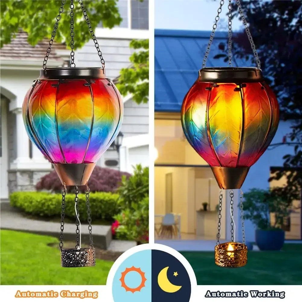 Solar-powered colorful lantern hanging outdoors with automatic charging and working indicators.