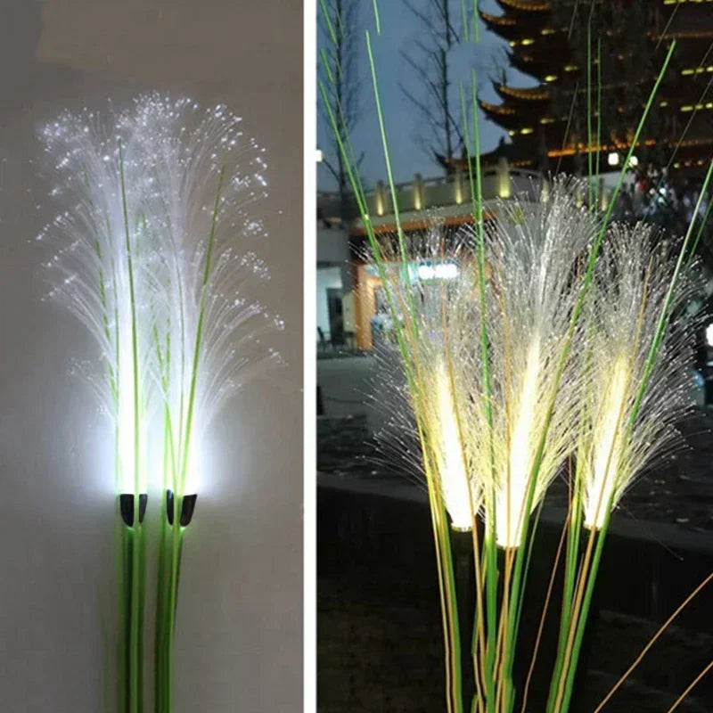 Decorative LED grass lights on a plain background and outdoors at night.
